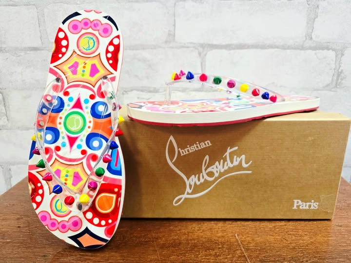 Christian Louboutin Loubi Flip Spikes Donna Sandals at Serendipity Consignment Boutique in Fuquay-Varina, NC